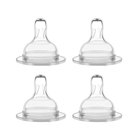 Four clear baby bottle nipples on a white background