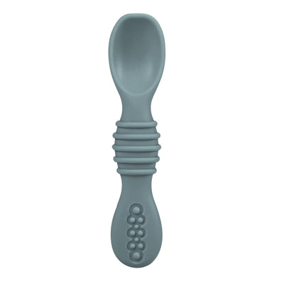Blue silicone spoon on a white background