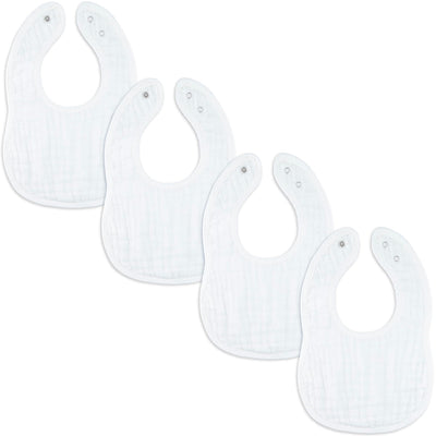 Set of five white baby bibs on a white background