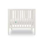 Newton Baby Galileo Mini Crib Solid Beech Wood with Wheels in Warm White, Mini Crib Mattress Included, Adjustable Mattress Height, Ultra-Safe Non-Toxic Finish