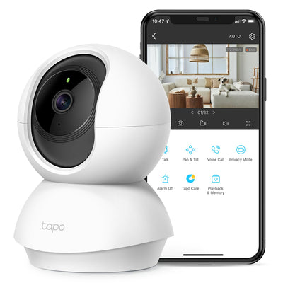 White TP-Link Tapo security camera with smartphone displaying app interface on a white background