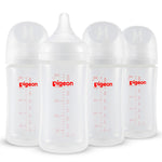Four Pigeon baby bottles with measurement markings on a white background