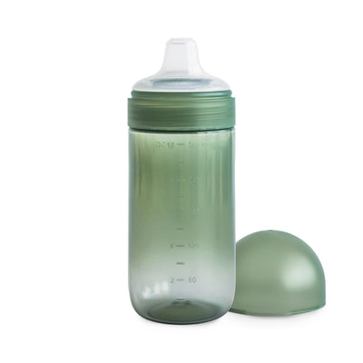 Green sippy cup with lid on a white background