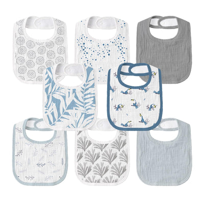Collection of baby bibs with various patterns on a white background