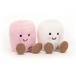 Two plush marshmallow toys, one pink and one white, on a white background