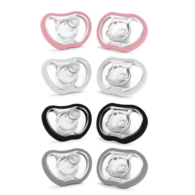 Set of six baby pacifiers in pink, white, and black on a white background.