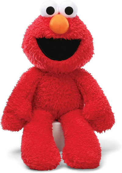 Red plush toy with a large orange nose and white eyes on a white background