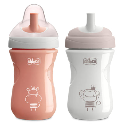 Two Chicco baby bottles, one pink and one white, with animal illustrations on a white background.