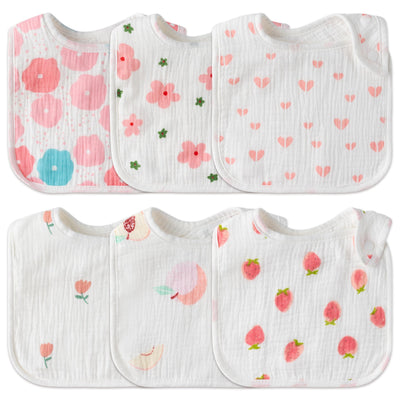 Set of baby bibs with floral patterns on a white background
